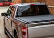Load image into Gallery viewer, Lomax Professional Series Tonneau cover displayed on a Silver Ford F150. 