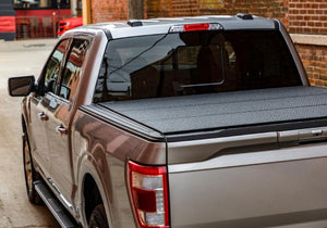 Lomax Professional Series Tonneau cover displayed on a Silver Ford F150. 