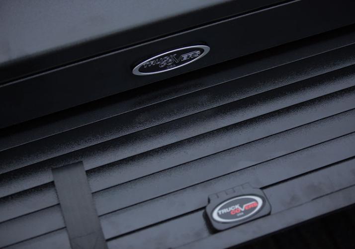 Closeup of the badges on the Truck Covers USA Work Cover Jr.