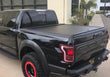 Load image into Gallery viewer, Truck Covers USA American Roll Cover displayed closed on a black Ford F150