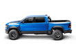 Load image into Gallery viewer, BAKFlip MX4 is being displayed folded all the way open on a blue Ram 1500 truck. 