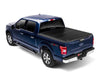 Load image into Gallery viewer, BAKFlip Fibermax being displayed closed on a blue Ford F150.