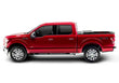 Load image into Gallery viewer, Profile view of the BAKFlip G2 displayed with two panels folded open on a red Ford F150 truck.