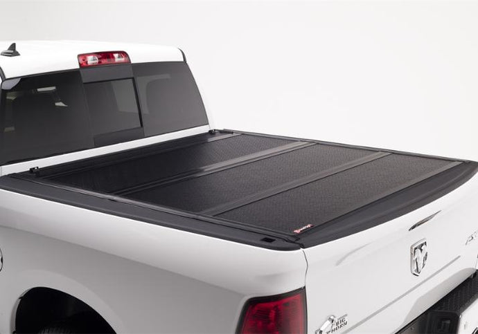 BAKFlip F1 being displayed on a white Ram 1500 truck.