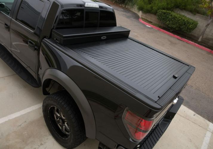 Truck Covers USA Work Cover Jr displayed on a black Ford F150.