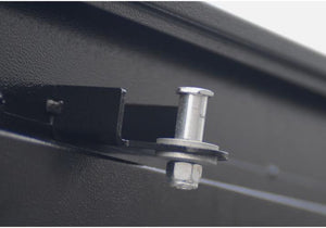 Closeup of the latch striker bolt on the Truck Covers USA Work Cover.